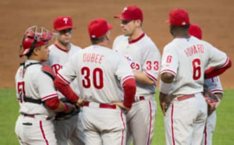 CLEVELAND, OH – MAY 1: Pitching coach Rich Dubee #30 talks with starting pitcher Cliff Lee #33 of the Philadelphia Phillies during the third inning against the Cleveland Indians at Progressive Field on May 1, 2013 in Cleveland, Ohio. (Photo by Jason Miller/Getty Images)