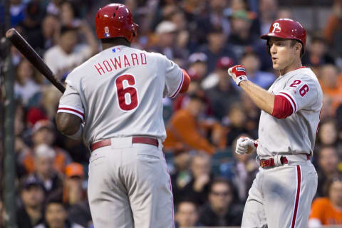 SAN FRANCISCO, CA – MAY 06: Chase Utley #26 of the Philadelphia Phillies is congratulated by Ryan Howard #6 after scoring a run on a wild pitch by Madison Bumgarner #40 of the San Francisco Giants (not pictured) during the second inning at AT&T Park on May 6, 2013 in San Francisco, California. (Photo by Jason O. Watson/Getty Images)