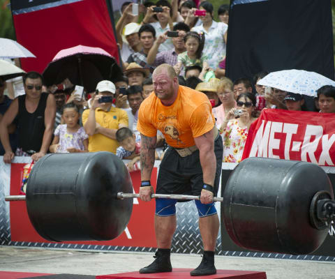 HAINAN ISLAND, CHINA – AUGUST 24: Hafthor Bjornsson of Iceland competes at the Deadlift for Max event during the World’s Strongest Man competition at Yalong Bay Cultural Square on August 24, 2013 in Hainan Island, China. (Photo by Victor Fraile/Getty Images)