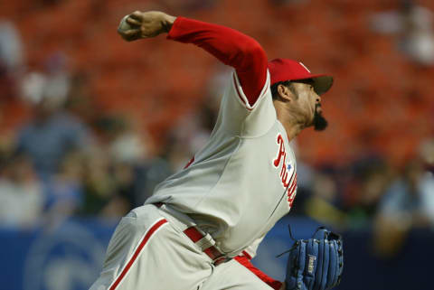 FLUSHING, NY – JULY 12: Jose Mesa #49 of the Philadelphia Phillies pitches against the New York Mets on July 12, 2003 at Shea Stadium in Flushing, New York. The Phillies defeated the Mets in 11 innings 4-2. (Photo by Chris Trotman/Getty Images)