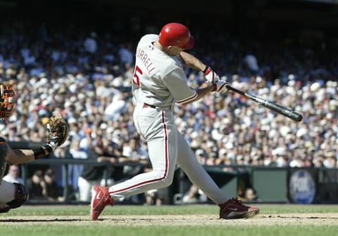 SAN FRANCISCO – AUGUST 9: Pat Burrell #5 of the Philadelphia Phillies hits his second home run of the day against the San Francisco Giants during a game at Pac Bell Park on August 9, 2003 in San Francisco, California. (Photo by Jed Jacobsohn/Getty Images)