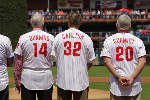 PHILADELPHIA – AUGUST 10: (L-R) Phillies Alumni and Hall of Famers Jim Bunning, Steve Carlton, and Mike Schmidt stand on the field during a pre game ceremony before a game between the Philadelphia Phillies and the New York Mets at Citizens Bank Park on August 10, 2014 in Philadelphia, Pennsylvania. The Phillies won 7-6. (Photo by Hunter Martin/Getty Images)