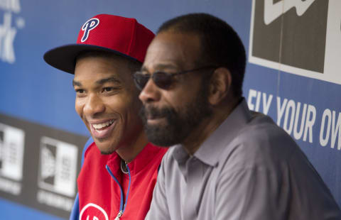 PHILADELPHIA, PA – SEPTEMBER 8: Center fielder Ben Revere #2 of the Philadelphia Phillies sits in the dugout with former Phillies outfielder Gary Maddox prior to the game against the Pittsburgh Pirates on September 8, 2014 at Citizens Bank Park in Philadelphia, Pennsylvania. (Photo by Mitchell Leff/Getty Images)