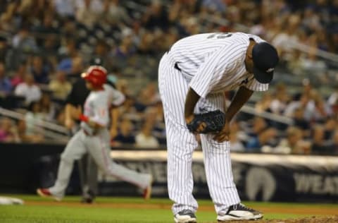 NEW YORK, NY – JUNE 23: CC Sabathia #52 of the New York Yankees reacts after giving up a three run home run against Maikel Franco #7 of the Philadelphia Phillies in the fourth inning during their game at Yankee Stadium on June 23, 2015 in New York City. (Photo by Al Bello/Getty Images)