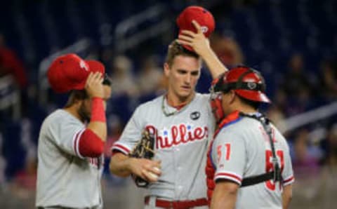 MIAMI, FL – SEPTEMBER 23: David Buchanan #55 and Carlos Ruiz #51 of the Philadelphia Phillies talk during a game against the Miami Marlins at Marlins Park on September 23, 2015 in Miami, Florida. (Photo by Mike Ehrmann/Getty Images)