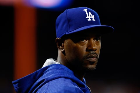 NEW YORK, NY – OCTOBER 13: Jimmy Rollins #11 of the Los Angeles Dodgers looks on from the dugout against the New York Mets during game four of the National League Division Series at Citi Field on October 13, 2015 in New York City. (Photo by Mike Stobe/Getty Images)