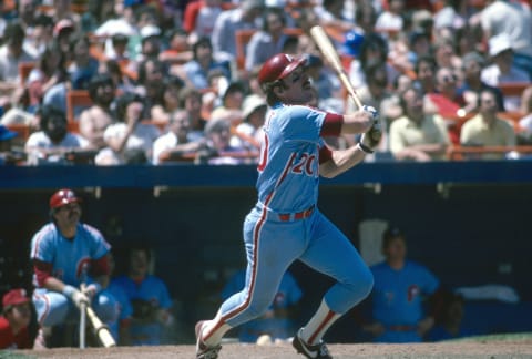 NEW YORK – CIRCA 1982: Mike Schmidt #20 of the Philadelphia Phillies swings and watches the flight of his ball against the New York Mets during an Major League Baseball game circa 1982 at Shea Stadium in the Queens borough of New York City. Schmidt played for the Phillies from 1972-89. (Photo by Focus on Sport/Getty Images)