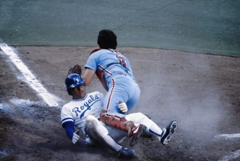 KANSAS CITY, MO – OCTOBER 1980: Darrell Porter of the Kansas City Royals slides into home and upends Bob Boone of the Philadelphia Phillies during the World Series at Royals Stadium in Kansas City, Missouri in October of 1980. (Photo by Focus on Sport via Getty Images)