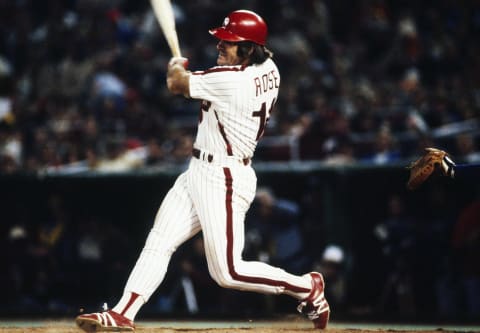 PHILADELPHIA – OCTOBER 1980: Philadelphia Phillies’ infielder Pete Rose #14 swings and connects during the World Series against the Kansas City Royals at Veterans Stadium in October of 1980 in Philadelphia, Pennsylvania. (Photo by Focus on Sport via Getty Images)