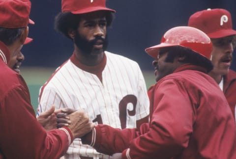 PHILADELPHIA, PA – 1980: Philadelphia Phillies’ outfielder Garry Maddox #31 is congratulated by teammates during a game at Veterans Stadium circa 1980 in Philadelphia, Pennsylvania. (Photo by Focus on Sport/ Getty Images)