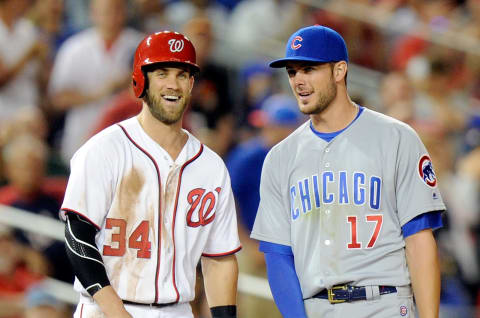 WASHINGTON, DC – JUNE 14: Bryce Harper #34 of the Washington Nationals talks with Kris Bryant #17 of the Chicago Cubs during the eighth inning at Nationals Park on June 14, 2016 in Washington, DC. Chicago won the game 4-3. (Photo by G Fiume/Getty Images)