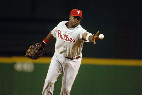 WASHINGTON – SEPTEMBER 3: Ryan Howard of the Philadelphia Phillies fields a ground ball during a game against the Washington Nationals on September 3, 2005, at RFK Stadium in Washington D.C. The Nationals defeated the Phillies 5-4. (Photo by Mitchell Layton/MLB Photos via Getty Images)