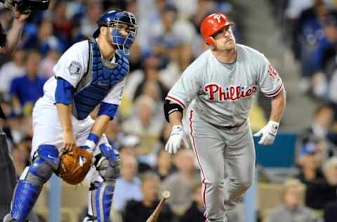 Phillies Matt Stairs watches his two–run home run along with Dodgers catcher Russell Martin sail into the right field stands to give the Phillies a 7–5 lead in the 8th inning in Game 4 of the NLCS in Los Angeles Monday. (Photo by Wally Skalij/Los Angeles Times via Getty Images)