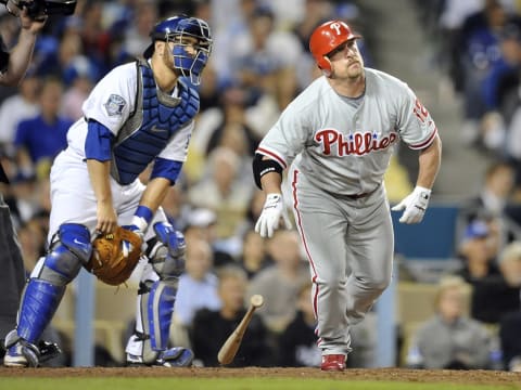 Phillies Matt Stairs watches his two–run home run along with Dodgers catcher Russell Martin sail into the right field stands to give the Phillies a 7–5 lead in the 8th inning in Game 4 of the NLCS in Los Angeles Monday. (Photo by Wally Skalij/Los Angeles Times via Getty Images)