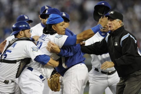 12 October 2008: Los Angeles Dodgers Manny Ramirez had to be restrained by catcher Russell Martin and Manager Joe Torre when benches clear with the Philadelphia Phillies during the game 3 of NLCS in Los Angeles, CA. (Photo by Matt A. Brown /Icon SMI/Icon Sport Media via Getty Images)