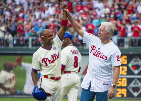 June 14, 2014: Philadelphia Phillies shortstop Jimmy Rollins (11) greeted at first base by Mike Schmidt (20) as Jimmy Rollins passes his career hit record during a Major League Baseball game between the Philadelphia Phillies and the Chicago Cubs at Citizens Bank Park in Philadelphia, Pennsylvania. (Photo by Gavin Baker/Icon SMI/Corbis via Getty Images)