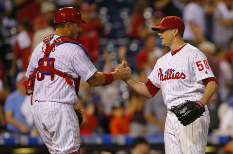 PHILADELPHIA, PA – SEPTEMBER 17: Catcher A.J. Ellis #34 congratulates pitcher Jeremy Hellickson #58 after the final out in the ninth inning for a complete game shutout against the Miami Marlins during a game at Citizens Bank Park on September 17, 2016 in Philadelphia, Pennsylvania. The Phillies defeated the Marlins 8-0. (Photo by Rich Schultz/Getty Images)