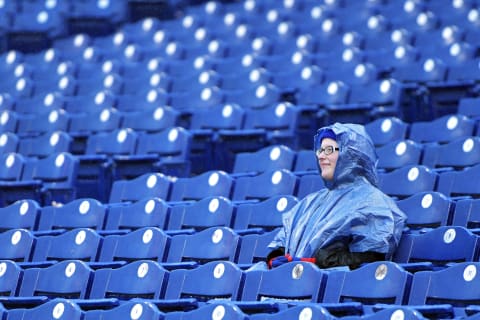 PHILADELPHIA, PA – APRIL 25: A lone fan sits in the stands before the game is postponed between the Miami Marlins and Philadelphia Phillies at Citizens Bank Park on April 25, 2017 in Philadelphia, Pennsylvania. (Photo by Drew Hallowell/Getty Images)