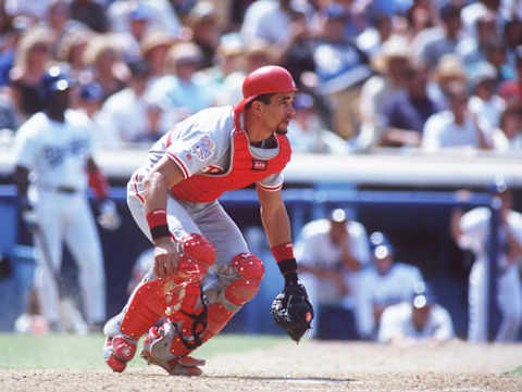 19 May 1996: Catcher Benito Santiago of the Philadelphia Phillies looks to catch the ball during their 5-4 win over the Los Angeles Dodgers at Dodger Stadium in Los Angeles, California. Mandatory Credit: Jamie Squire/Allsport