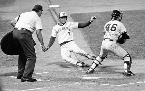 MILWAUKEE, WI – 1977: Don Money #7 of the Milwaukee Brewers sliding into home plaste during a game at County Stadium in 1977 in Milwaukee, Wisconsin. (Photo by Ronald C. Modra/Getty Images)