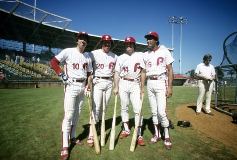 CIRCA 1980’s: Left to Right, infielder Larry Bowa #10, infielder Mike Schmidt #20, outfielder Pete Rose #14 and infielder Manny Trillo #6, of the Philadelphia Phillies pose for a photo before a spring training MLB baseball game circa early 1980’s. Rose Played for the Phillies from 1979-83, Bowa from 1970-81, Schmidt from 1972-89, Trillo from 1979-82. (Photo by Focus on Sport/Getty Images)