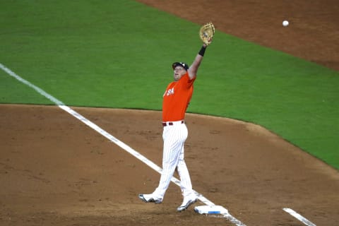 MIAMI, FL – JULY 09: Rhys Hoskins #12 of the Philadelphia Phillies and the U.S. Team attempts to field the throw against the World Team during the SiriusXM All-Star Futures Game at Marlins Park on July 9, 2017 in Miami, Florida. (Photo by Rob Carr/Getty Images)