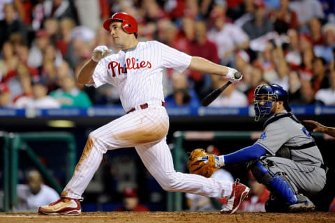 PHILADELPHIA – OCTOBER 09: Pat Burrell #5 of of the Philadelphia Phillies hits a solo home run to give the Phillies a 3-2 lead in the bottom of the sixth inning against the Los Angeles Dodgers in Game One of the National League Championship Series during the 2008 MLB playoffs on October 9, 2008 at Citizens Bank Ballpark in Philadelphia, Pennsylvania. (Photo by Jeff Zelevansky/Getty Images)