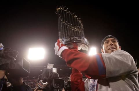 PHILADELPHIA – OCTOBER 29: Greg Dobbs #19 of the Philadelphia Phillies celebrates with the World Series Championship trophy after their 4-3 win against the Tampa Bay Rays during the continuation of game five of the 2008 MLB World Series on October 29, 2008 at Citizens Bank Park in Philadelphia, Pennsylvania. (Photo by Doug Pensinger/Getty Images)