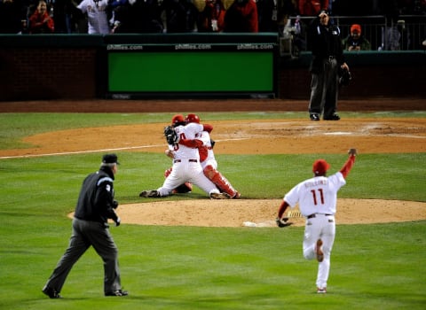 PHILADELPHIA – OCTOBER 29: Catcher Carlos Ruiz #51 and Brad Lidge #54 of the Philadelphia Phillies celebrate after recording the final out of their 4-3 win to win the World Series against the Tampa Bay Rays during the continuation of game five of the 2008 MLB World Series on October 29, 2008 at Citizens Bank Park in Philadelphia, Pennsylvania. (Photo by Jeff Zelevansky/Getty Images)