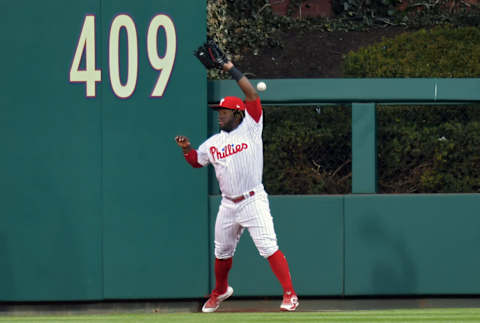 PHILADELPHIA, PA – APRIL 11: Odubel Herrera #37 of the Philadelphia Phillies drops the ball for an error in the first inning against the Cincinnati Reds at Citizens Bank Park on April 11, 2018 in Philadelphia, Pennsylvania. (Photo by Drew Hallowell/Getty Images)