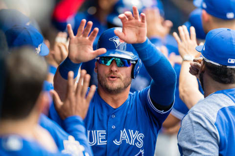 CLEVELAND, OH – MAY 3: Josh Donaldson #20 of the Toronto Blue Jays celebrates after scoring off a single by Yangervis Solarte #26 during the fourth inning against the Cleveland Indians at Progressive Field on May 3, 2018 in Cleveland, Ohio. All players are wearing #42 in honor of Jackie Robinson Day in this makeup game from April 15. (Photo by Jason Miller/Getty Images)