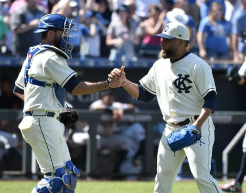 KANSAS CITY, MO – MAY 6: Drew Butera #9 of the Kansas City Royals and Kelvin Herrera #40 of the Kansas City Royals celebrate a 4-2 win over the Detroit Tigers at Kauffman Stadium on May 6, 2018 in Kansas City, Missouri. (Photo by Ed Zurga/Getty Images)