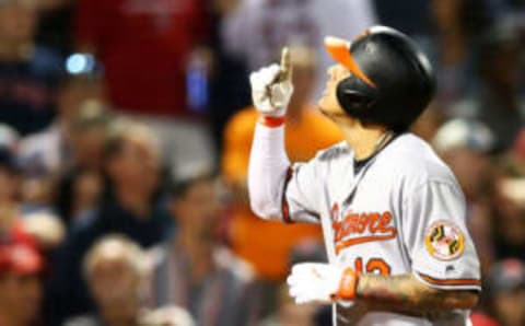 BOSTON, MA – MAY 17: Manny Machado #13 of the Baltimore Orioles reacts as he crosses home plate after hitting a two-run home run in the ninth inning of a game against the Boston Red Sox at Fenway Park on May 17, 2018 in Boston, Massachusetts. (Photo by Adam Glanzman/Getty Images)