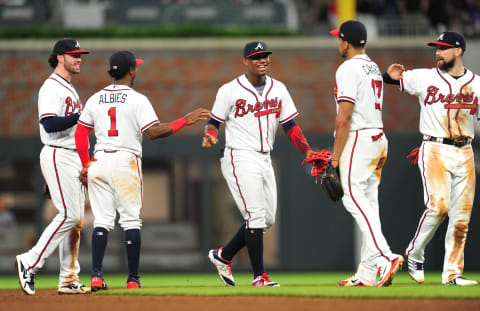 ATLANTA, GA. – MAY 19: Dansby Swanson #7, Ozzie Albies #1, Ronald Acuna, Jr. #13, Johan Camargo #17, and Ender Inciarte #11 of the Atlanta Braves celebrate after the game against the Miami Marlins at SunTrust Field on May 19, 2018 in Atlanta, Georgia. (Photo by Scott Cunningham/Getty Images)