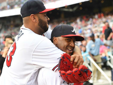 ATLANTA, GA. – MAY 19: Luiz Gohara #53 of the Atlanta Braves puts a bear hug on Ozzie Albies #1 before game against the Miami Marlins at SunTrust Field on May 19, 2018 in Atlanta, Georgia. (Photo by Scott Cunningham/Getty Images)