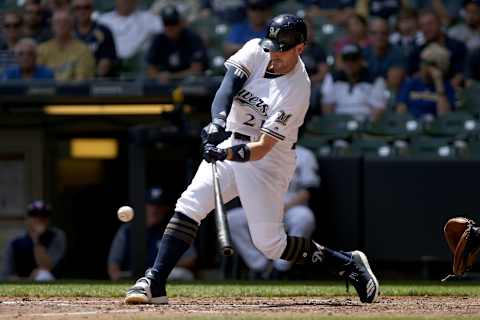 MILWAUKEE, WI – MAY 23: Travis Shaw #21 of the Milwaukee Brewers hits a home run in the fourth inning against the Arizona Diamondbacks at Miller Park on May 23, 2018 in Milwaukee, Wisconsin. (Photo by Dylan Buell/Getty Images)