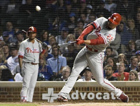 CHICAGO, IL – JUNE 06: Dylan Cozens #25 of the Philadelphia Phillies hits a two-run home run against the Chicago Cubs during the ninth inning on June 6, 2018 at Wrigley Field in Chicago, Illinois. (Photo by David Banks/Getty Images)