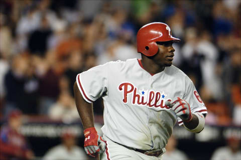 UNITED STATES – AUGUST 26: Philadelphia Phillies’ first baseman Ryan Howard watches the flight of his grand slam home run to right field as he rounds the bases during the fifth inning of game against the New York Mets at Shea Stadium. The Phillies were held scoreless for the rest of the game as the Mets won, 11-5. (Photo by James Keivom/NY Daily News Archive via Getty Images)