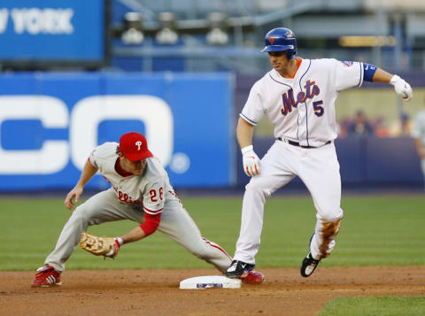 UNITED STATES – JUNE 05: Philadelphia Phillies’ second baseman Chase Utley takes the late throw as New York Mets’ David Wright reaches for a double in the second inning of a game at Shea Stadium. The Mets went on to lose, 4-2, in extra innings. (Photo by Linda Cataffo/NY Daily News Archive via Getty Images)