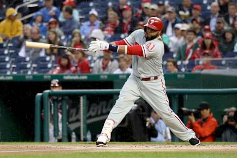 WASHINGTON, DC – JUNE 22 : Carlos Santana #41 of the Philadelphia Phillies follows his two RBI single in the first inning against the Philadelphia Phillies at Nationals Park on June 22, 2018 in Washington, DC. (Photo by Rob Carr/Getty Images)