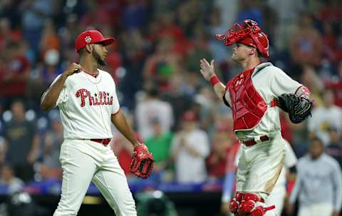 PHILADELPHIA, PA – JULY 03: Seranthony Dominguez #58 of the Philadelphia Phillies celebrates with Andrew Knapp #15 after saving a game against the Baltimore Orioles at Citizens Bank Park on July 3, 2018 in Philadelphia, Pennsylvania. The Phillies won 3-2. (Photo by Hunter Martin/Getty Images)