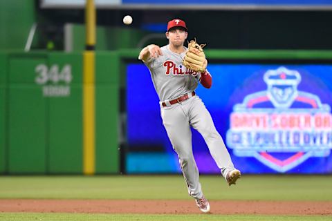 MIAMI, FL – JULY 14: Scott Kingery #4 of the Philadelphia Phillies throws towards first base during the third inning against the Miami Marlins at Marlins Park on July 14, 2018 in Miami, Florida. (Photo by Eric Espada/Getty Images)