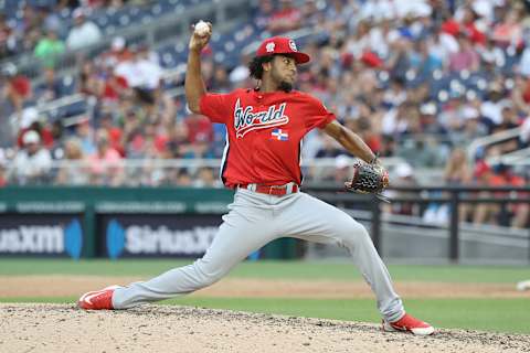 WASHINGTON, DC – JULY 15: Adonis Medina of the World Team pitches in the seventh inning against the U.S. Team during the SiriusXM All-Star Futures Game at Nationals Park on July 15, 2018 in Washington, DC. (Photo by Rob Carr/Getty Images)