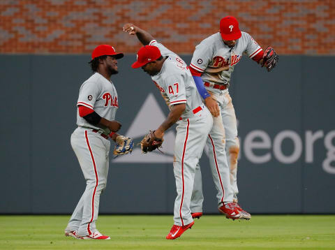 ATLANTA, GA – JUNE 06: Odubel Herrera #37, Howie Kendrick #47 and Aaron Altherr #23 of the Philadelphia Phillies celebrate their 3-1 win over the Atlanta Braves at SunTrust Park on June 6, 2017 in Atlanta, Georgia. (Photo by Kevin C. Cox/Getty Images)