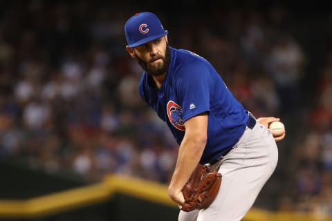 PHOENIX, AZ – AUGUST 13: Starting pitcher Jake Arrieta #49 of the Chicago Cubs looks over to first base as he pitches against the Arizona Diamondbacks during the first inning of the MLB game at Chase Field on August 13, 2017 in Phoenix, Arizona. (Photo by Christian Petersen/Getty Images)