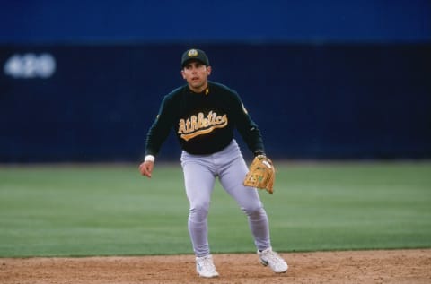 7 Mar 1999: Infielder Jorge Velandia #13 of the Oakland Athletics moves for the ball during the Spring Training game against the Anaheim Angels at the Tempe Diablo Stadium in Tempe, Arizona. The Angels defeated the Athletics 9-8. Mandatory Credit: Tom Hauck /Allsport