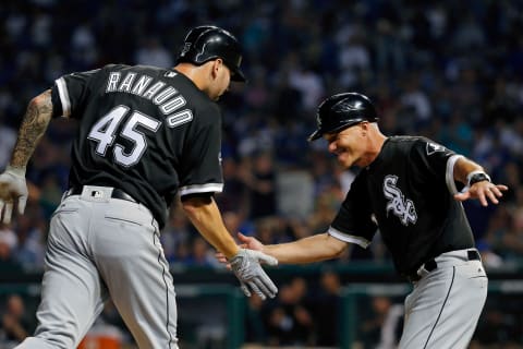 CHICAGO, IL – JULY 27: Anthony Ranaudo #45 of the Chicago White Sox is congratulated by third base coach Joe McEwing #47 after hitting a one run home run against the Chicago Cubs during the fifth inning at Wrigley Field on July 27, 2016 in Chicago, Illinois. (Photo by Jon Durr/Getty Images)