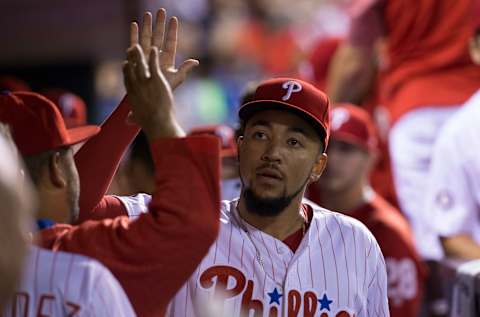 PHILADELPHIA, PA – SEPTEMBER 18: J.P. Crawford #2 of the Philadelphia Phillies hive fives his teammates in the dugout after throwing out Yasiel Puig #66 of the Los Angeles Dodgers (NOT PICTURED) in the top of the eighth inning at Citizens Bank Park on September 18, 2017 in Philadelphia, Pennsylvania. The Phillies defeated the Dodgers 4-3. (Photo by Mitchell Leff/Getty Images)