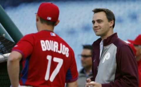 PHILADELPHIA, PA – APRIL 15: Matt Klentak, right, Vice President and General Manager of the Philadelphia Phillies talks with Peter Bourjos