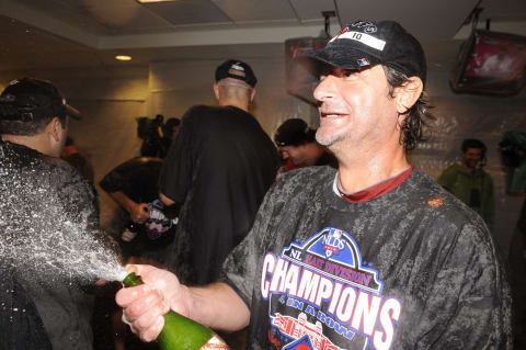 WASHINGTON – SEPTEMBER 27: Jamie Moyer of the Philadelphia Phillies celebrates clinching the National League EasT title after a baseball game against the Washington Nationals on September 27, 2010 at Nationals Park in Washington, D.C. The Phillies won 8-0. (Photo by Mitchell Layton/Getty Images)